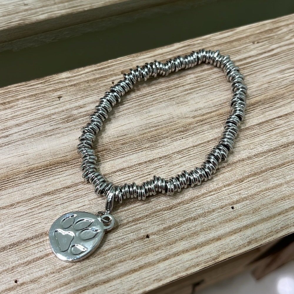 Silver stretch bracelet with paw charm